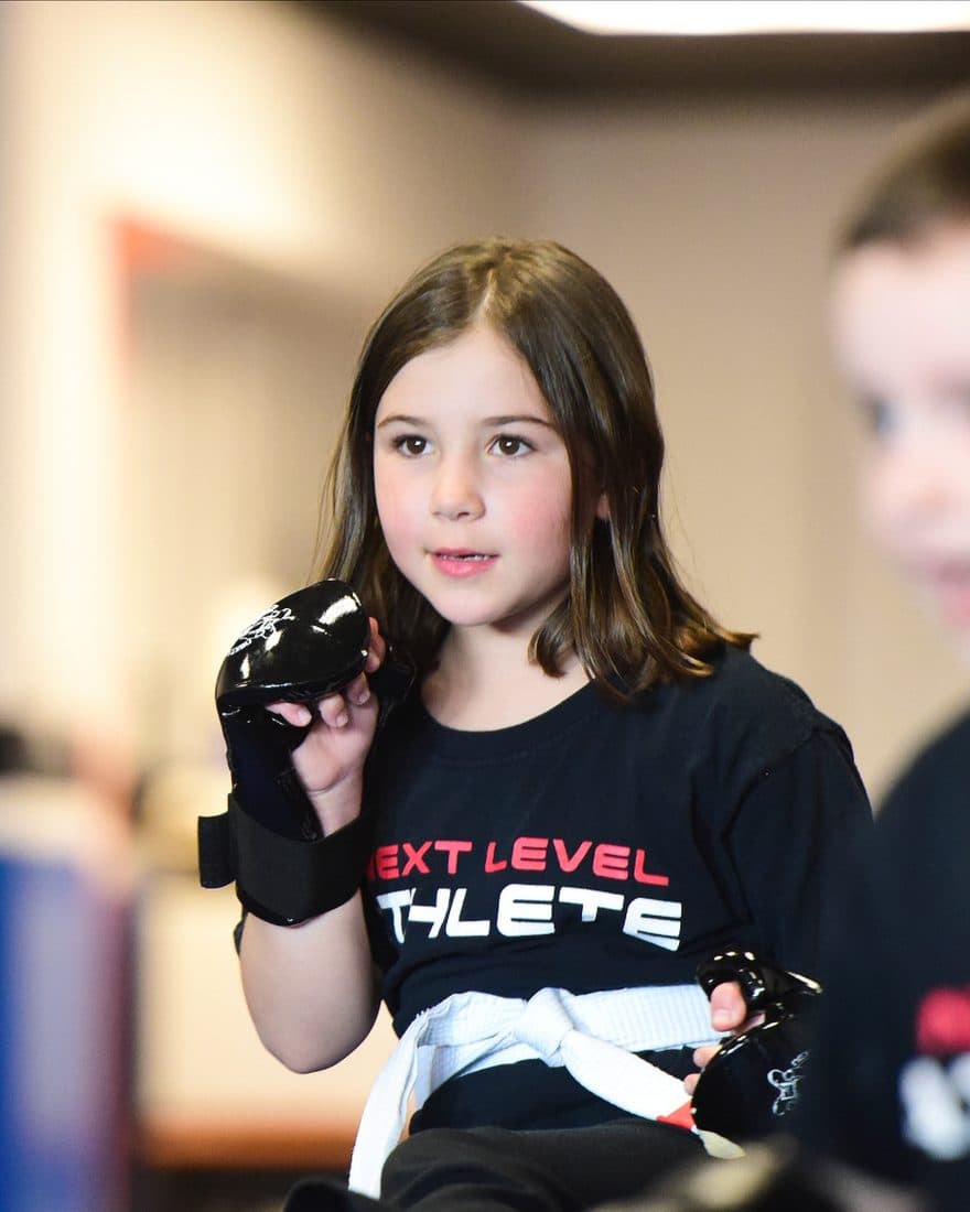 Young student training during a kids martial arts class at Next Level Martial Arts